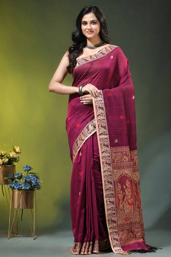 magenta cotton blend saree with floral motifs