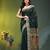 green cotton blend saree with floral motifs