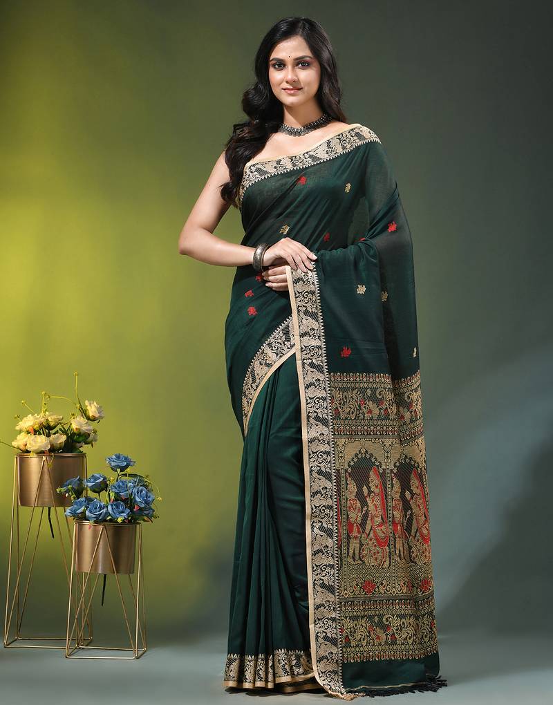 green cotton blend saree with floral motifs