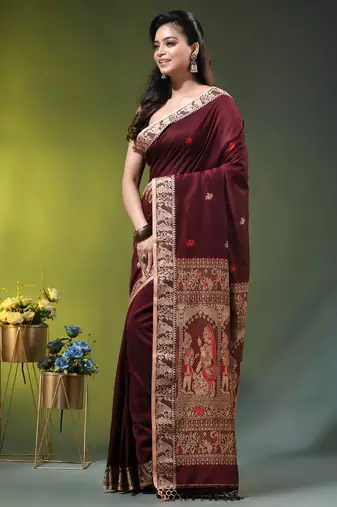 maroon cotton blend saree with floral motifs
