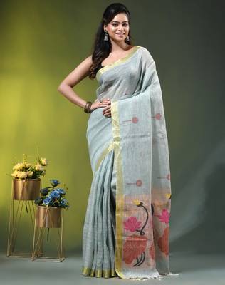 Sky blue linen saree with red floral woven design 1