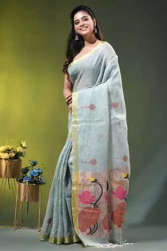 Sky blue linen saree with red floral woven design