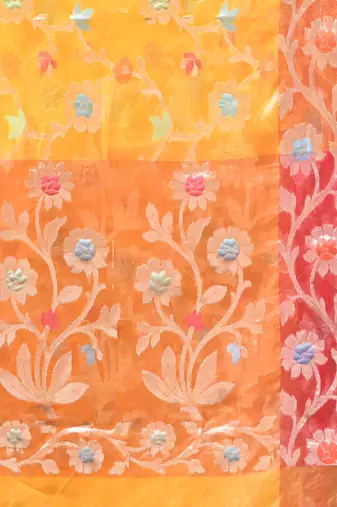 Yellow floral zari woven organza saree