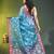 Firoza blue floral zari woven organza saree