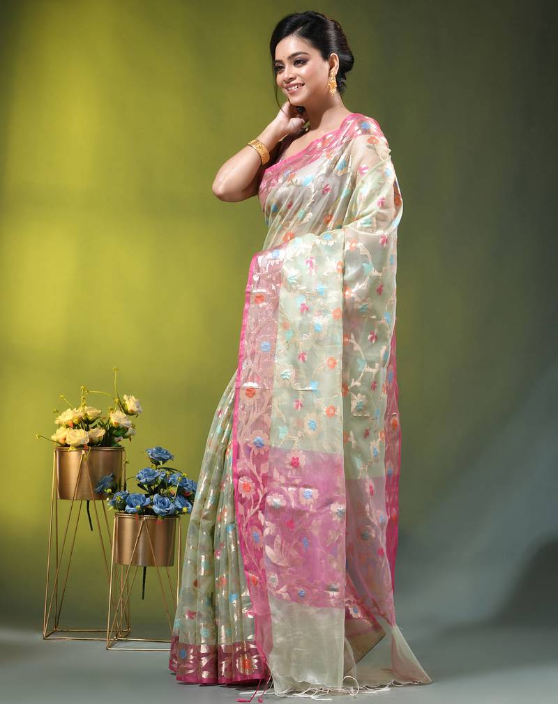 Light green floral zari woven organza saree
