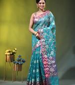 Aqua blue floral zari woven organza saree
