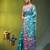 Aqua blue floral zari woven organza saree
