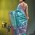 Aqua blue floral zari woven organza saree