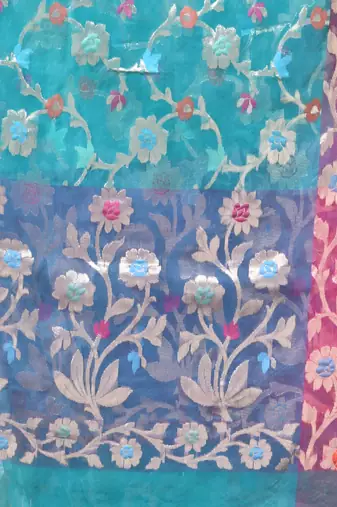 Aqua blue floral zari woven organza saree