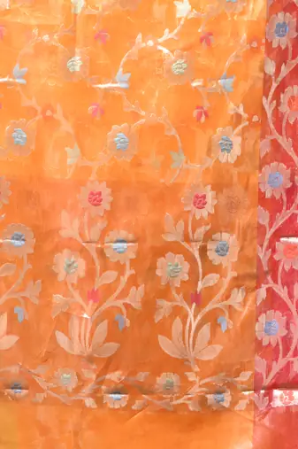 Orange floral zari woven organza saree