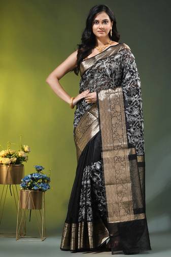 Elegant black organza saree with white floral embroidery & rich golden zari border