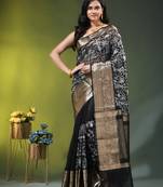 Elegant black organza saree with white floral embroidery & rich golden zari border