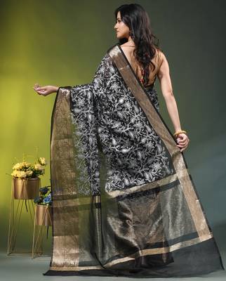 Elegant black organza saree with white floral embroidery & rich golden zari border 3