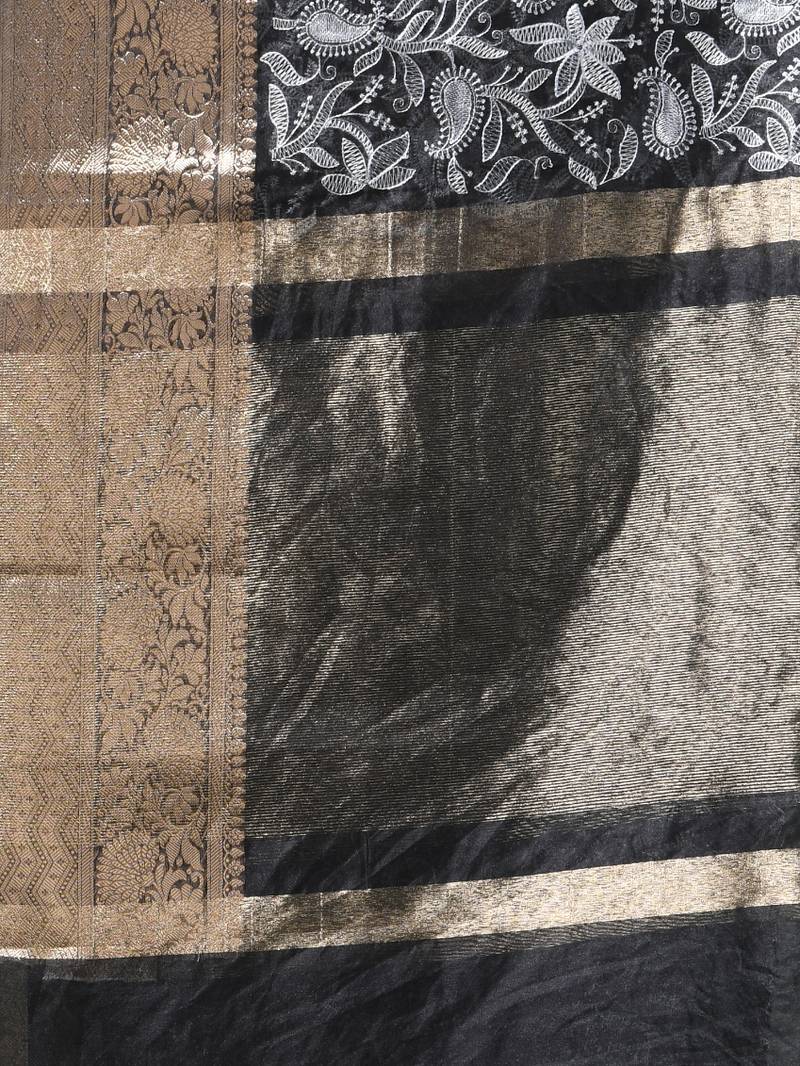 Elegant black organza saree with white floral embroidery & rich golden zari border