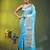 Elegant sky blue organza saree with white floral embroidery & rich golden zari border
