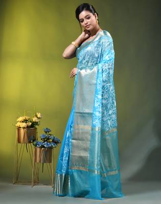 Elegant sky blue organza saree with white floral embroidery & rich golden zari border 2