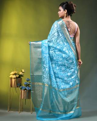 Elegant sky blue organza saree with white floral embroidery & rich golden zari border 3