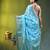 Elegant sky blue organza saree with white floral embroidery & rich golden zari border