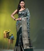 Elegant dark green organza saree with white floral embroidery & rich golden zari border
