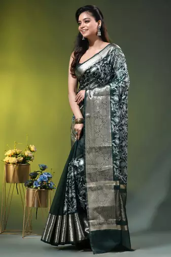 Elegant dark green organza saree with white floral embroidery & rich golden zari border