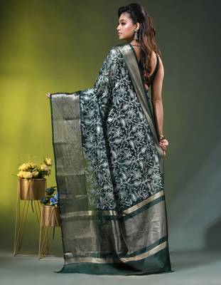 Elegant dark green organza saree with white floral embroidery & rich golden zari border 3