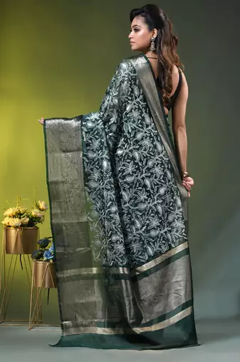 Elegant dark green organza saree with white floral embroidery & rich golden zari border