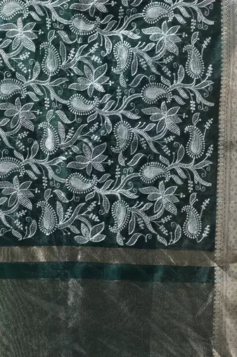 Elegant dark green organza saree with white floral embroidery & rich golden zari border