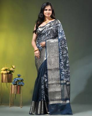 Elegant aegean blue saree with white floral embroidery & rich golden zari border 1