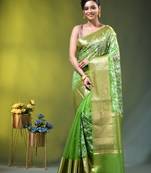 Elegant green organza saree with white floral embroidery & rich golden zari border