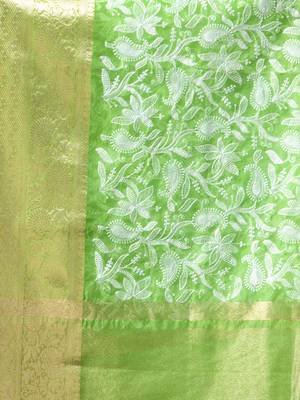 Elegant green organza saree with white floral embroidery & rich golden zari border 4