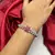 Silver Plated Floral Bangle Bracelet with Pink Cubic Zirconia and American Diamonds