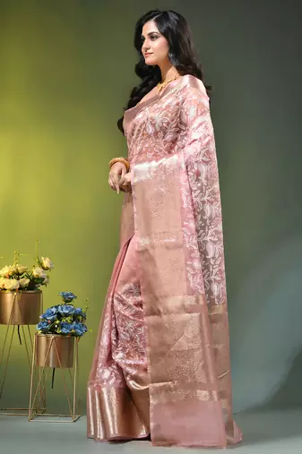 Elegant peach organza saree with white floral embroidery & rich golden zari border