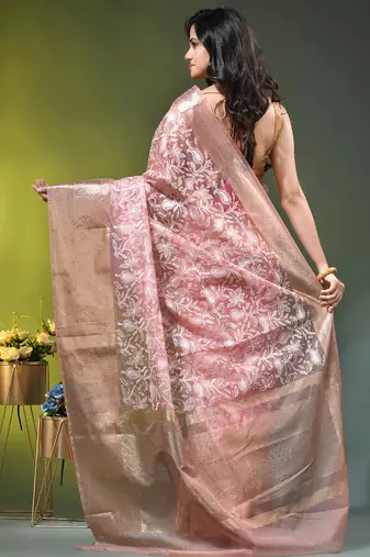 Elegant peach organza saree with white floral embroidery & rich golden zari border
