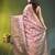 Elegant peach organza saree with white floral embroidery & rich golden zari border