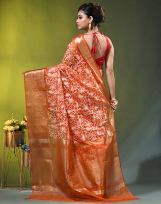 Elegant orange organza saree with white floral embroidery & rich golden zari border 3