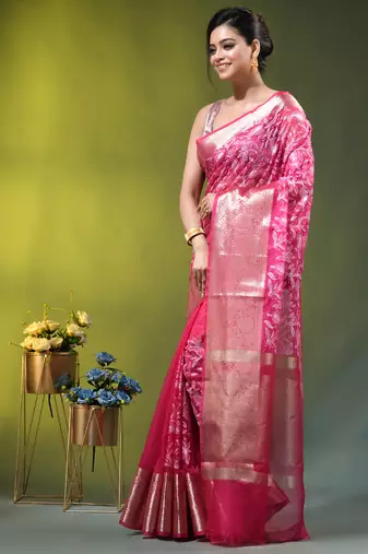 Elegant pink organza saree with white floral embroidery & rich golden zari border