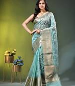 Elegant mint green organza saree with white floral embroidery & rich golden zari border