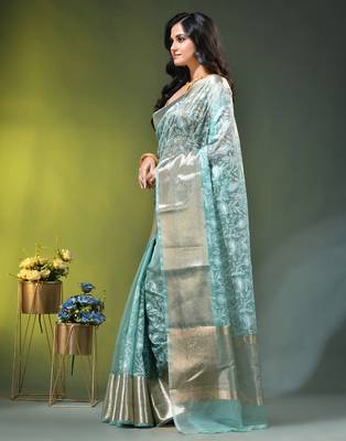 Elegant mint green organza saree with white floral embroidery & rich golden zari border 2