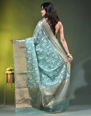 Elegant mint green organza saree with white floral embroidery & rich golden zari border 3