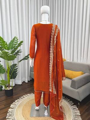 Rust orange embroidered straight kurta pant set with dupatta 5