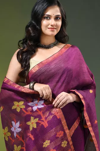 Dark purple linen saree with floral woven pallu