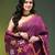 Dark purple linen saree with floral woven pallu