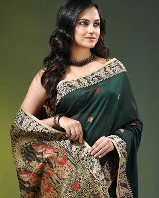 green cotton blend saree with floral motifs 5