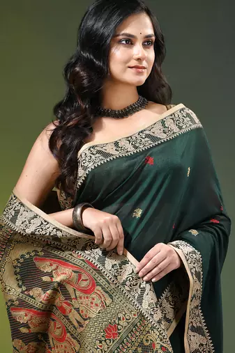 green cotton blend saree with floral motifs