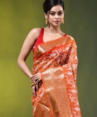 Elegant orange organza saree with white floral embroidery & rich golden zari border 5
