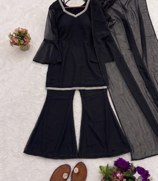 Women black georgette bell sleeve kurta with flared sharara & dupatta set