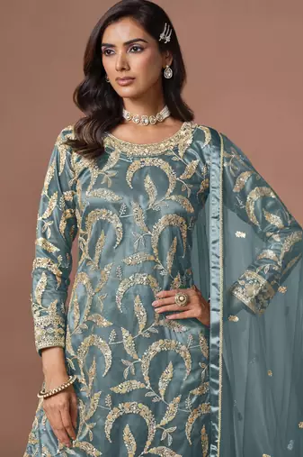 Sky blue net heavy thread embroidery, zari with sequins work salwar kameez