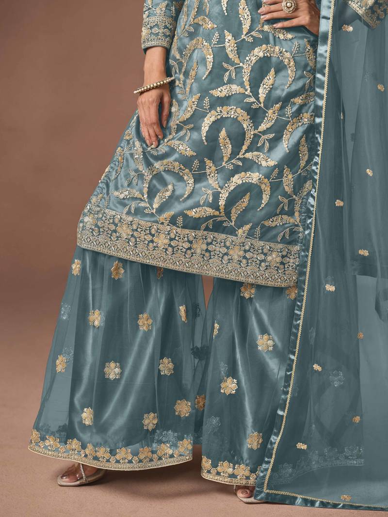 Sky blue net heavy thread embroidery, zari with sequins work salwar kameez