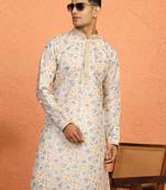 cream kurta featuring intricate floral patterns and mandarin collar