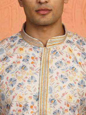 cream kurta featuring intricate floral patterns and mandarin collar 2